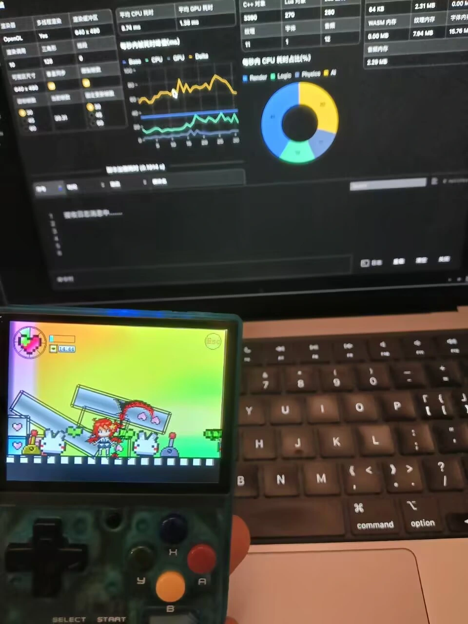 A game genuinely running on the handheld, with Dora's runtime and performance interface on the computer behind it